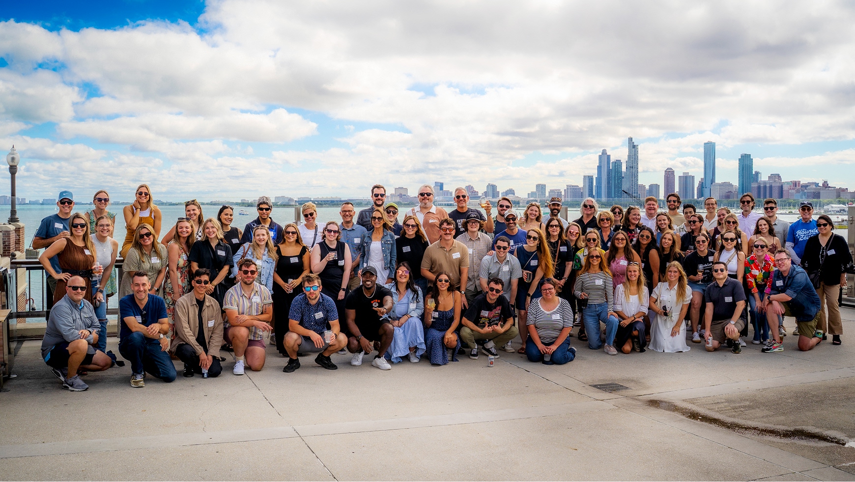 Portrait of Laughlin Constable Employees With Chicago Skyline in The Background